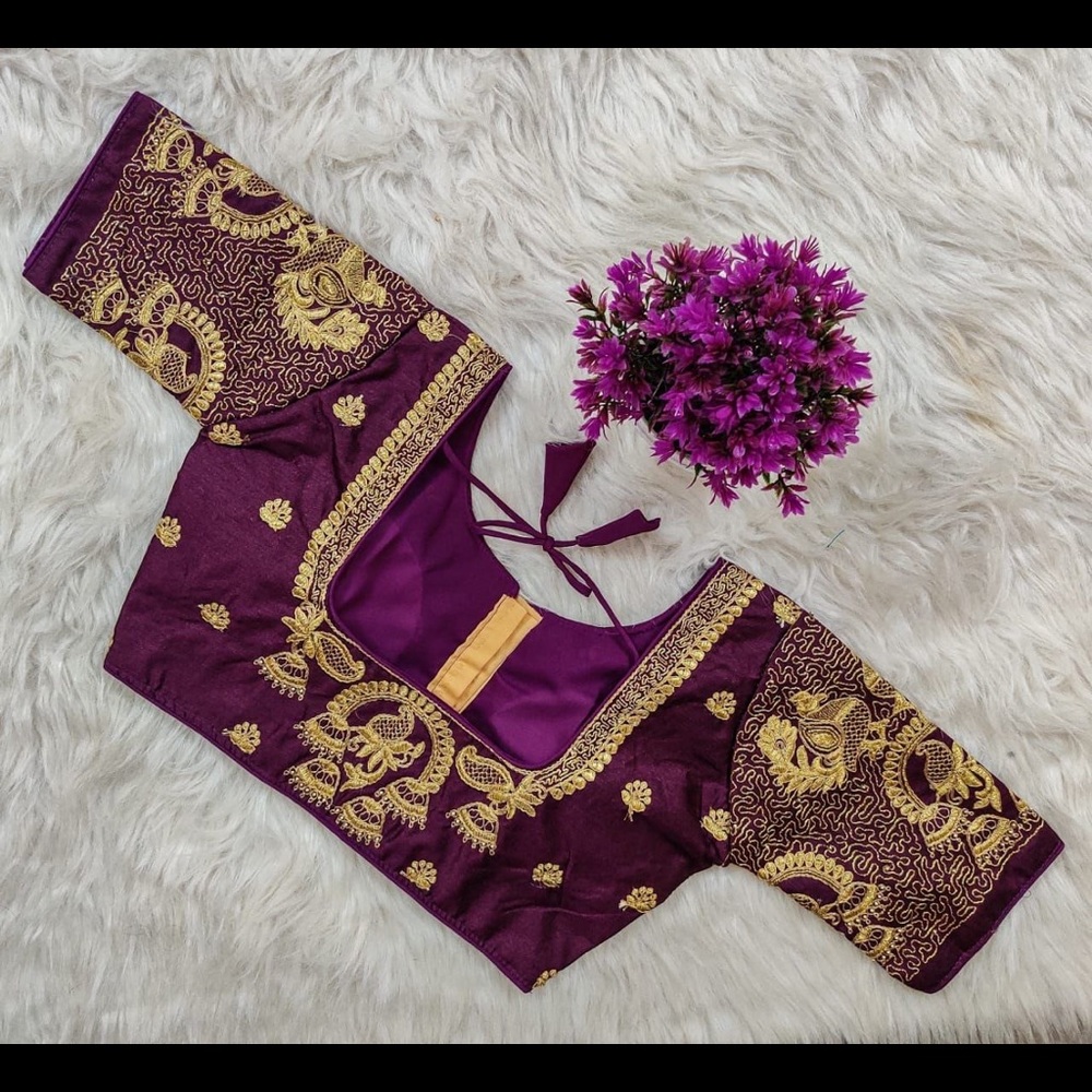 Embroidered blouse in silk fabric